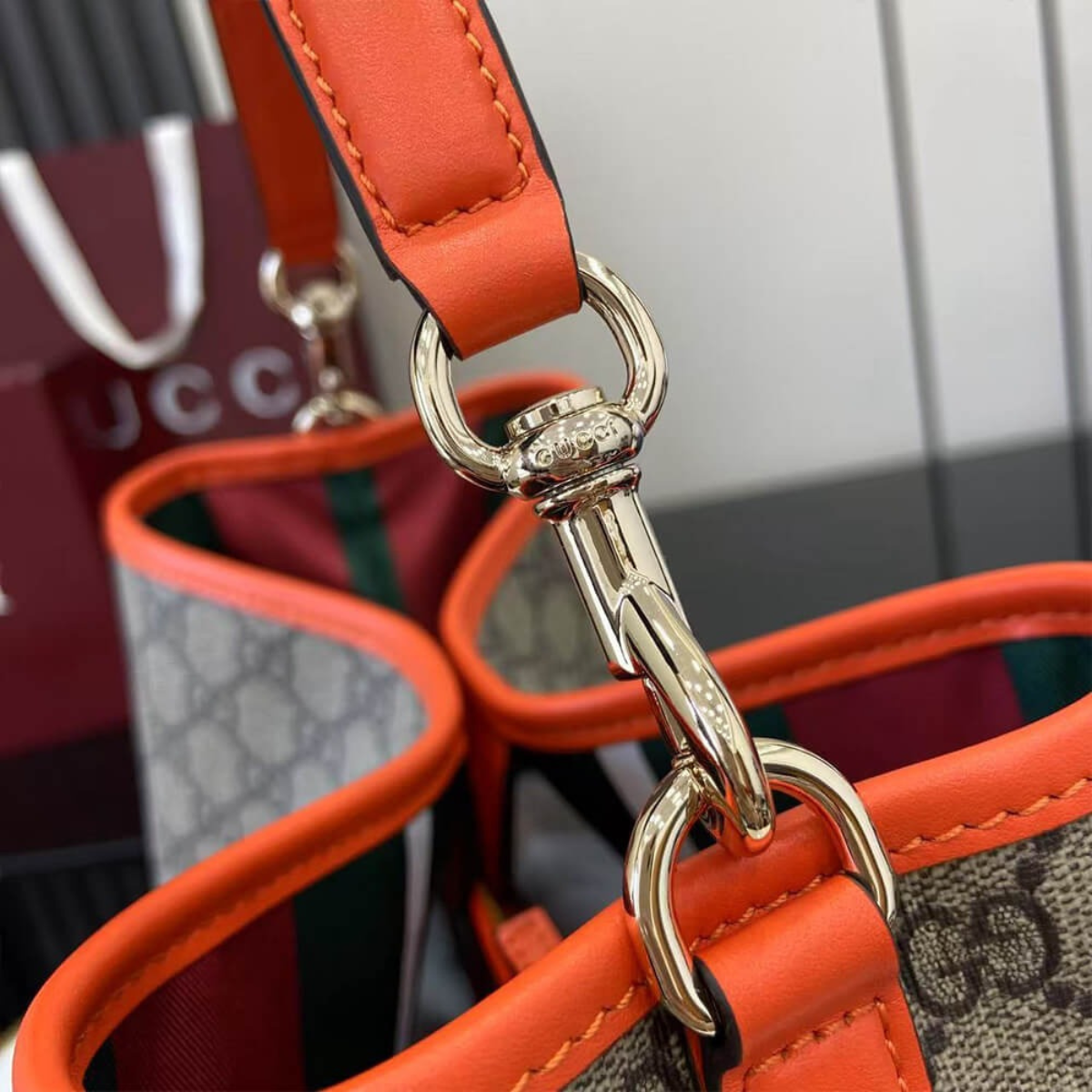 MEDIUM GG EMBLEM BUCKET BAG GUCCI